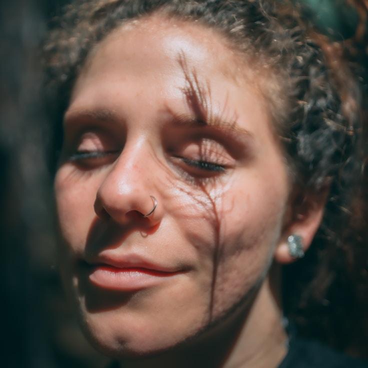 Kaveri Mehta, Lead Design Curator at Verdant & Vine, reviewing corporate floral arrangements